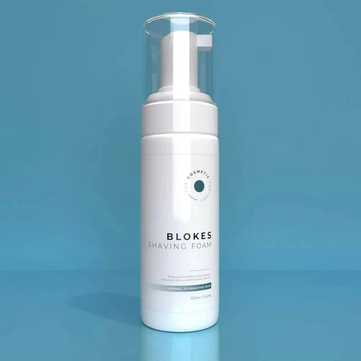 a bottle of blokes shaving foam 100ml on a blue background.