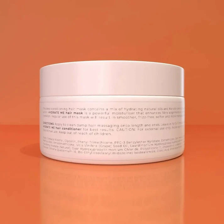 a jar of hydrate me hair mask 250ml on an orange background.