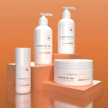 containers of hydrate me serum 100ml on an orange background.