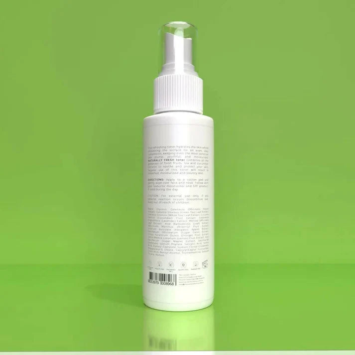 a bottle ofnaturally fresh toner 125ml on a green background.