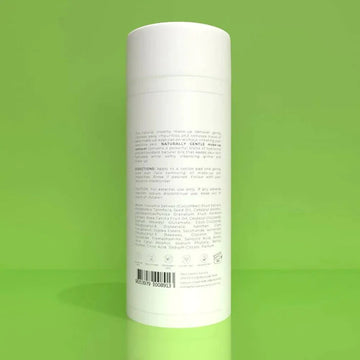 a tube of naturally gentle make-up remover 200ml on a green background.