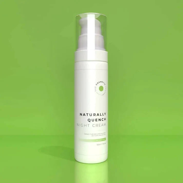 a bottle of naturally quench night cream 50ml sitting on a green surface.
