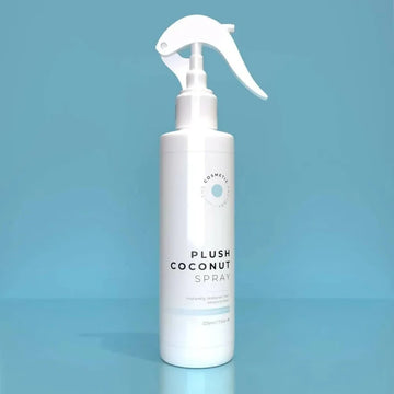 a bottle of phyto day cream 50ml on a blue surface.