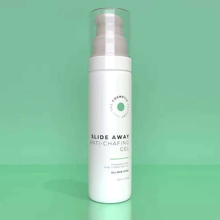a bottle of slide away anti-chafing gel 50ml sitting on a green surface.